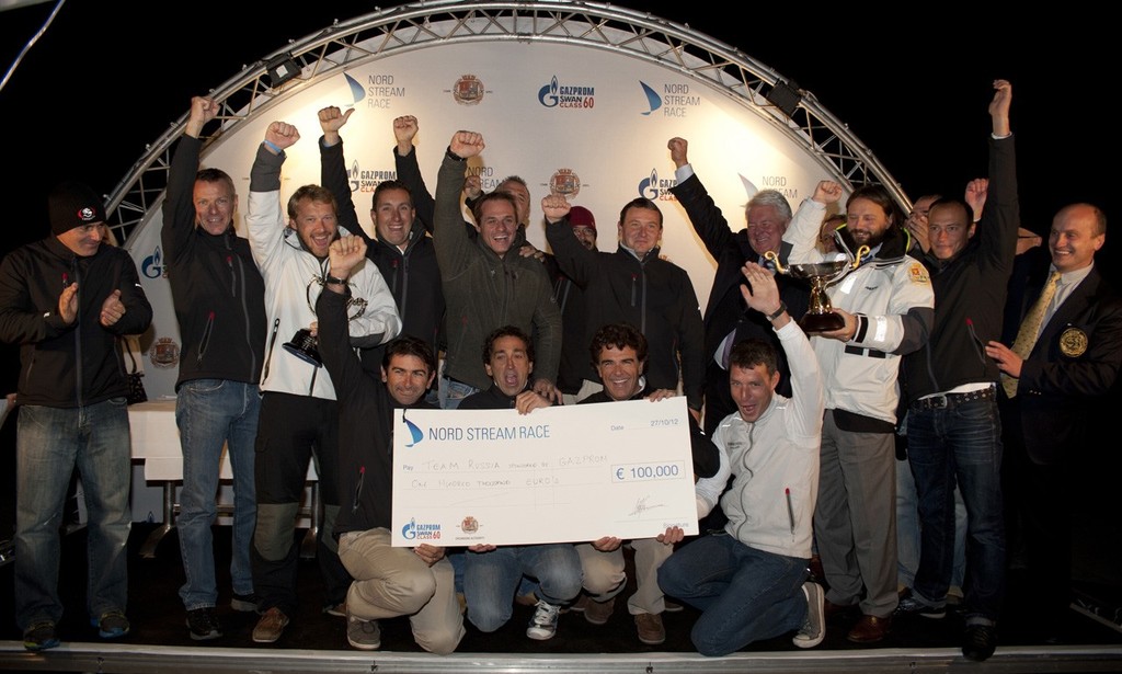 Valery Golubeb presenting the first place trophy to Vladimir Liubomiriv (Team Russia) and the crew, in Griefswald. © onEdition http://www.onEdition.com